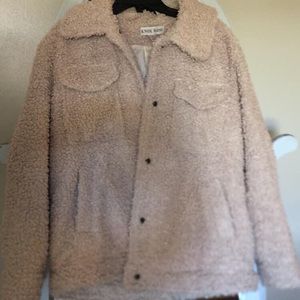 Creme colored fuzzy jacket size small. Only worn once! This is selling for $40